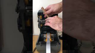 How to Install a Roll of Satin amp printer ribbon in to Zebras ZD220 Printer [upl. by Yeldoow]