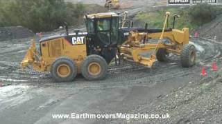 Cat 14M grader test in the rain [upl. by Ardnatal]