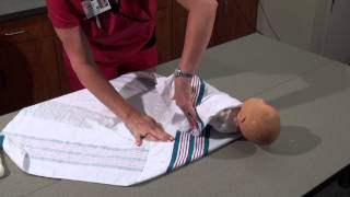 Parenting and Infant Care  How to Swaddle a Baby  Womans Hospital  Baton Rouge La [upl. by Drwde]