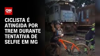 Ciclista é atingida por trem durante tentativa de selfie em MG  CNN NOVO DIA [upl. by Terrilyn]