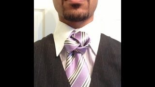 How to tie a tie The Four Rings Knot [upl. by Pardner]