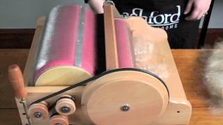 Carding fleece on an Ashford Drum Carder [upl. by Anived391]