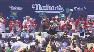 Joey Chestnut chokes protestor during Nathans Hot Dog Eating Contest 2022 [upl. by Oriole]