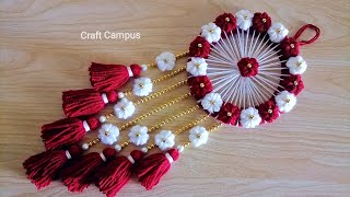 Super Easy Woolen Flower Wall Hanging Craft  Woolen Thread Craft Ideas  Woolen Wall Hanging Design [upl. by Griffith]