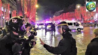 Un CRS jette une grenade lacrymogène sur des journalistes  Gilets jaunes ChampsÉlysées22122018 [upl. by Compte]