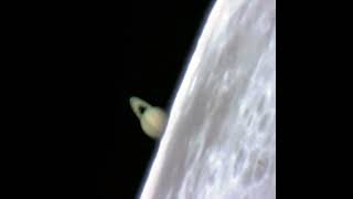 Saturn rising from behind the Moon during a lunar occultation captured from a ground based [upl. by Yeniar257]