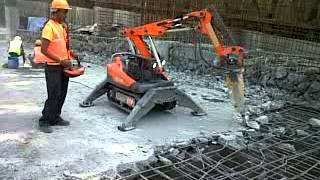 Robotic Demolition Machine Demolishing Concrete Slab  Dishmaancom [upl. by Heidie265]