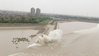 Worlds Largest Tidal Bore Forms in Chinas Qiantang River [upl. by Scheers636]