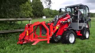 Weidemann minishovel met palen grasmaaier [upl. by Cara]