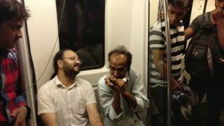 Mouth organ player in Delhi Metro  Munindra Sagar  Playing Gore Gore O Banke chhore [upl. by Pernick]