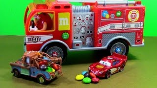 MampMs Fire Truck Dispenser with Lightning McQueen and Mater MampM Fire Engine [upl. by Clie]