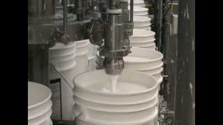 Pacific Packaging Machinery  Rotary Mass Flow Filler for Pails of Paint Home Care [upl. by Leblanc]