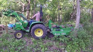 John Deere 3038E  switching attachments and the brush hog [upl. by Ttayh]