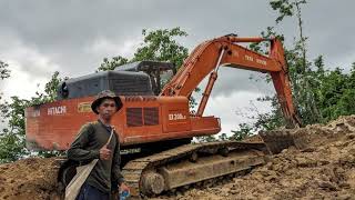 Excavating our small fishpond with a Hitachi excavator to make it much bigger [upl. by Scottie]