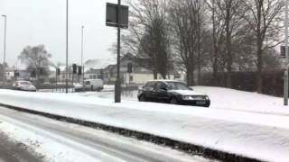 Cars struggle through snow on Willenhall Road [upl. by Bowers]