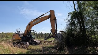 Awesome Operator Fence Row Clean Up and Tree Removal with a Case CX210D Excavator [upl. by Ainorev]