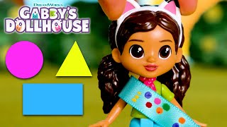 Find the Shapes Nature Scavenger Hunt with Gabby  GABBYS DOLLHOUSE TOY PLAY ADVENTURES [upl. by Alberic]