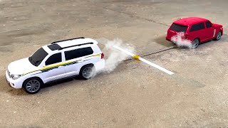 Land Cruiser Vs Range Rover RC Tug of War  Drag Race  Jump [upl. by Ellehsyt457]