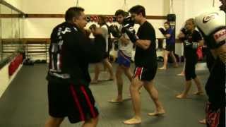 KRU Tip Muay Thai Footwork While Boxing [upl. by Hadihahs]