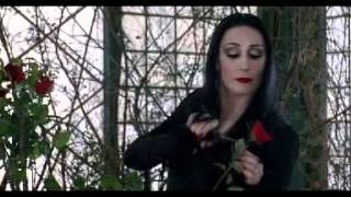 Addams FamilyMorticia cuts heads off roses [upl. by Acnaib772]