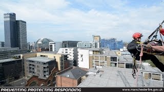 Firefighters scale 30metre crane in the Northern Quarter [upl. by Kcirdnekel]