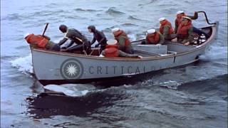 Training on use of a motor whale boat and rescue crew to rescue a downed US Navy HD Stock Footage [upl. by Lobel]