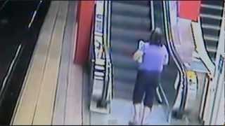 Motorized Scooter Gets Owned By the Escalator 071312 [upl. by Spieler]