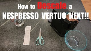 How to descale a Nespresso Vertuo Next machine [upl. by Annirac]