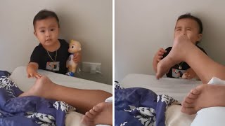 Baby tickles sleeping dad with totally shocking results [upl. by Ahsinrats823]