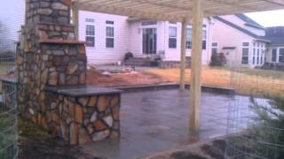 Outdoor living space fireplace pergola pond by Corad Outdoor Living and Home Improvement [upl. by Purse]