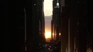 Crowds gather to witness biannual Manhattanhenge in New York City [upl. by Aillicirp]