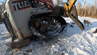 Installing new tracks on a track loader [upl. by Lap]