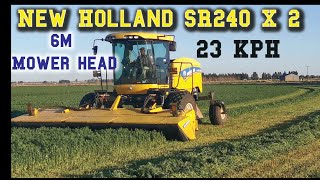 Cutting alfalfa with New Holland mowers [upl. by Azmuh]