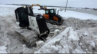 CAT D3 VS DOOSAN DD100  DOZERS PUSHING SNOW  ZieglerCAT DEVELONNorthAmerica [upl. by Soni]