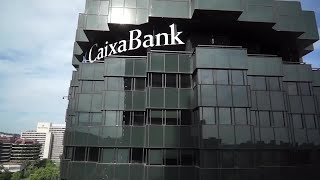 Caixabank gana 3145 millones en 2022 un 398 menos por el efecto de la fusión [upl. by Adnov84]