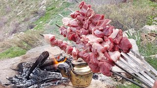 Lamb kebab at the Gate of HeavenDigging mountain plants to gourmet lambLamb roast and mountains [upl. by Ahsimot]