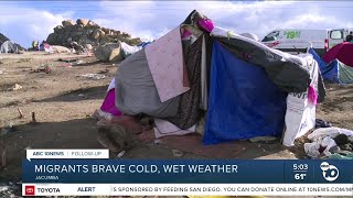 Migrants in Jacumba shelter against rain with makeshift tents [upl. by Namyh21]