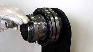 Dismounting spherical roller bearing with tapered bore from withdrawal sleeve using hydraulic nut [upl. by Agosto]