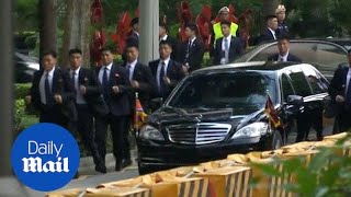 Kim Jong Uns bodyguards run beside his limo in Singapore [upl. by Ardyce545]