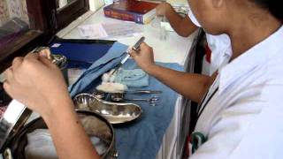 Nepali Nurses demonstrates sterile technique used to set up dressing change [upl. by Nirual]