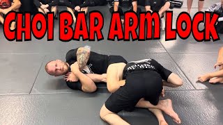 Choi bar arm lock from knee shield half guard [upl. by Kciwdahc]