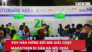 VĐV hào hứng đổi bib giải chạy marathon Di Sản Hà Nội 2024  Báo Lao Động [upl. by Salokin]