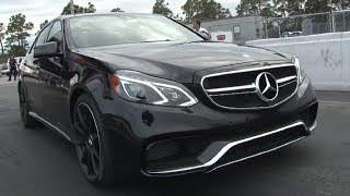 577 HP 2014 Mercedes E63S AMG 4Matic v Nissan GTR  14 Mile Drag Race Video  Road Test TV ® [upl. by Rosinski]