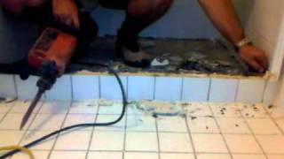 DiaOseal Australia  Quick and easy drummy shower floor tile removal [upl. by Nehr647]