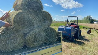 Range Road RRF900 mini round baler Making our first bale [upl. by Mehetabel752]