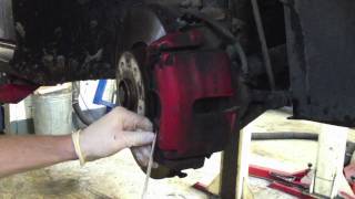 Replacing VW Golf Mk5 front brake pads and discs  quotHow toquot [upl. by Dreddy]