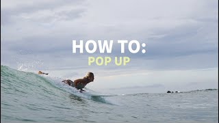 HOW TO Pop Up on a Surfboard  How to surf [upl. by Amaerd87]