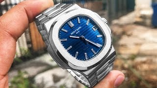 Patek Philippe Nautilus 57111A010 Luxury Watch Review [upl. by Auqenaj]