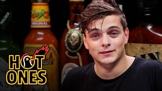 Martin Garrix Tests His Limits Eating Spicy Wings  Hot Ones [upl. by Carie]