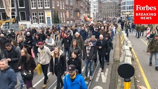 Protesters Demonstrate Against COVID19 Restrictions In Amsterdam [upl. by Noelyn]